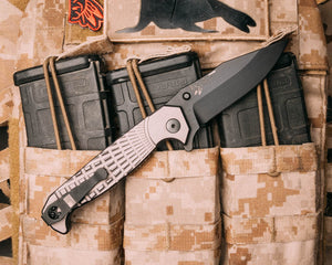 Crow Folder- Anodized grey handle, black nitride blade, grenade stippled Grip, deep carry clip