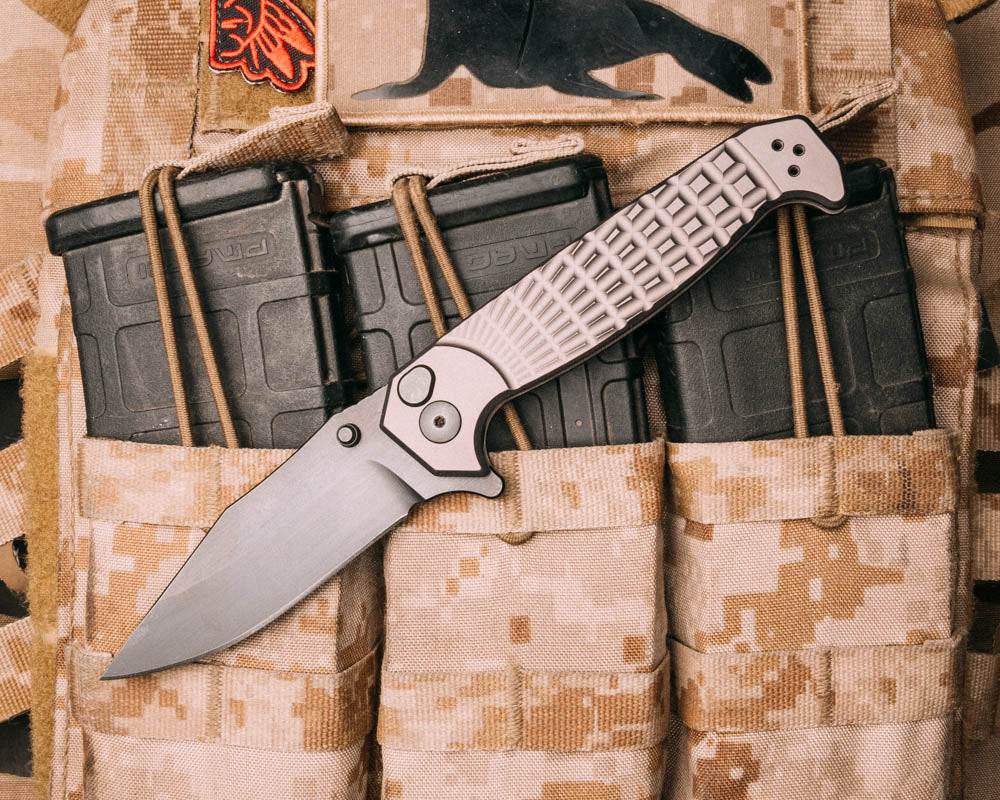 Crow Folder- Anodized grey handle, black nitride blade, grenade stippled Grip, deep carry clip