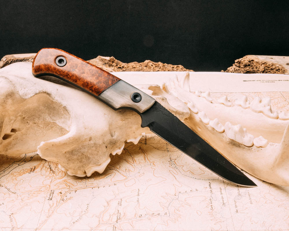 Boogeyman- Rams horn, black G10 split, Amboyna Burl, armor black cerakote, allen bolts, smooth grip