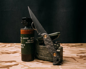 Congressman- Black Burlap micarta, Armor Black cerakote, brass allen bolts, iron grip